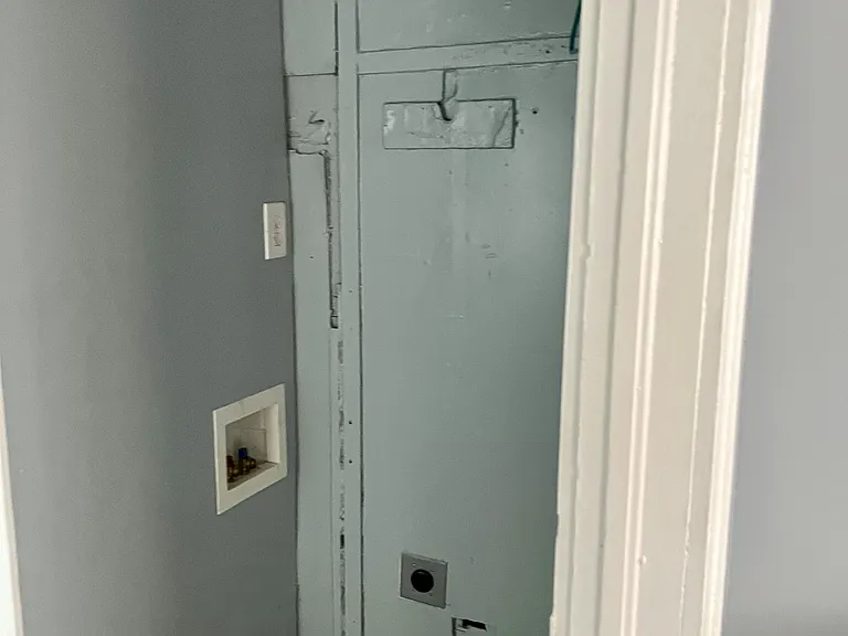 Apartment B utility for washer and dryer