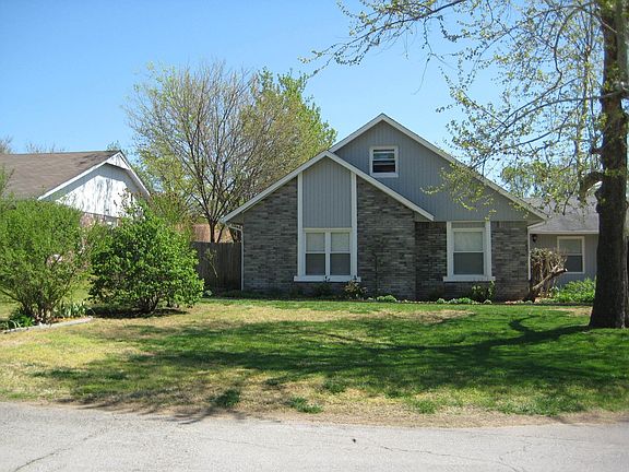 Front, flower bed with 6 hydrangeas & other plants