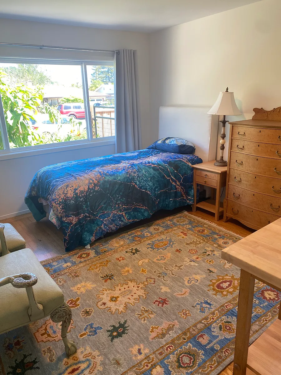 Spacious bedroom with adult size twin bed, nightstand, chair with ottoman, high it dresser and roomy closet - 421 Via Del Plano