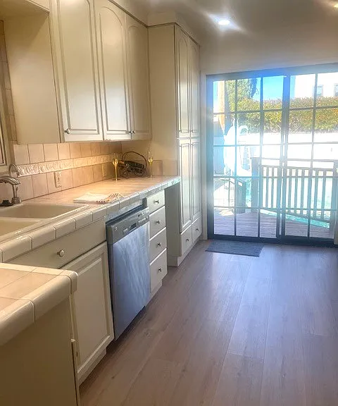 kitchen with sliding door to backyard