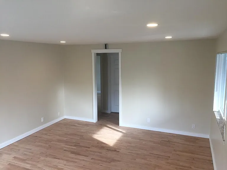 Living room looking towards hallway to bedrooms