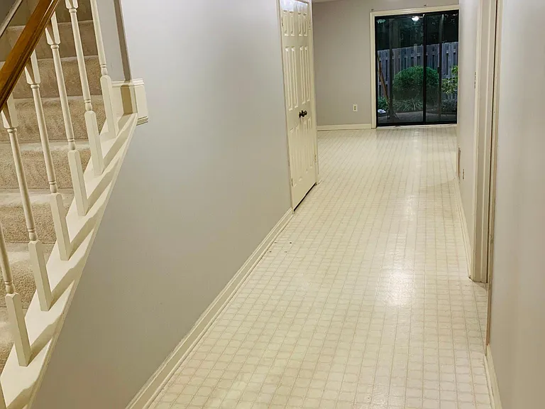 lower level with walk out to brick patio and pond