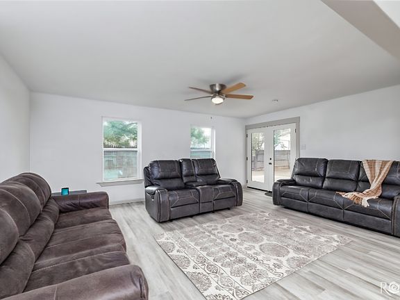 Additional Living room with sitting area, 3 couches