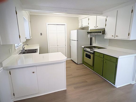 Kitchen with adjacent Laundry.