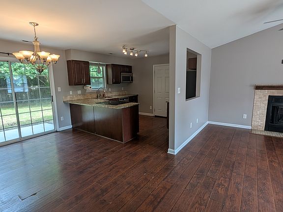 Kitchen, Dining room and Living room.