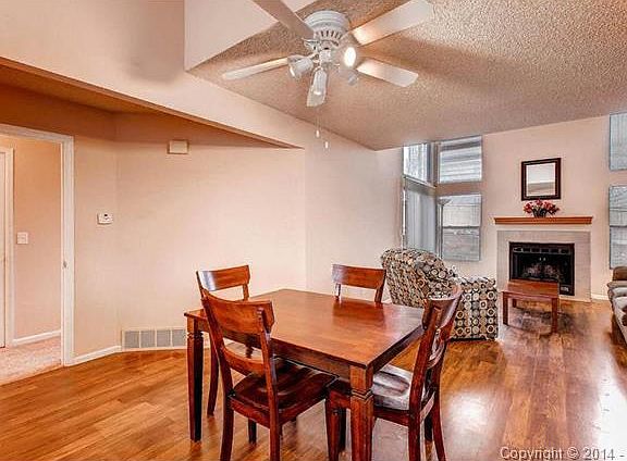 Gleaming new laminate floors flow from the kitchen to the great