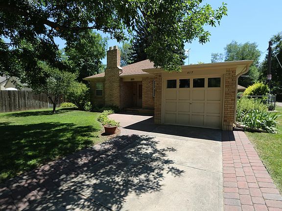 Front of home with off street parking in driveway.