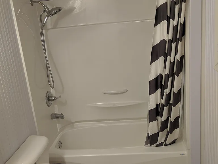 1 st floor full bath next to first floor bedroom