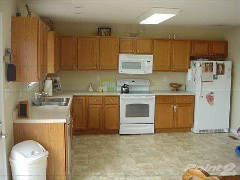 Large Kitchen with plenty of cabinet space.