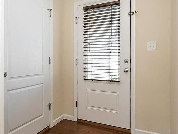 Beautiful front door with lots of natural light.