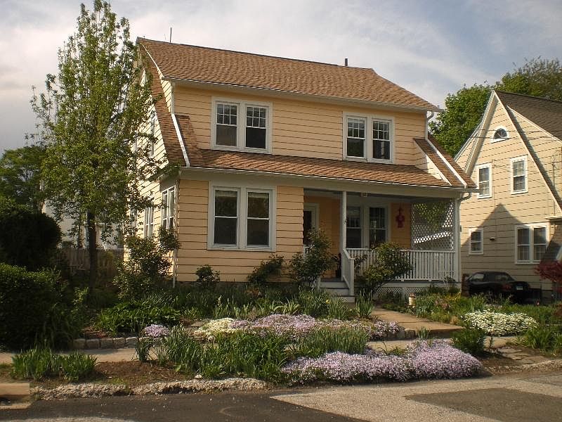 Spacious Colonial with Front Porch
        Charm!