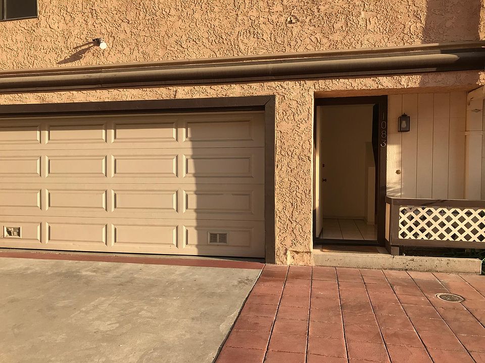 Exterior picture of entry door and garage.