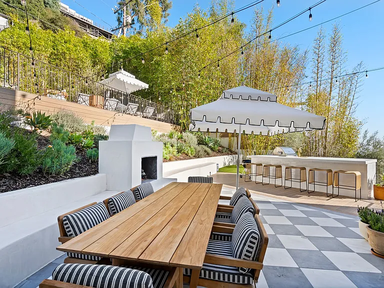 Al fresco dining made effortless with a built-in BBQ and spacious bar.