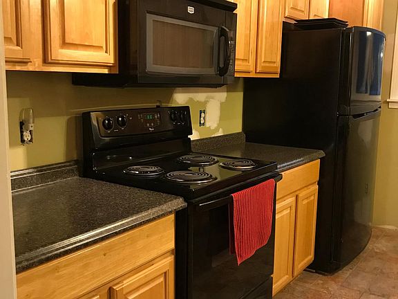 Matching Stove, Microwave, and Refrigerator.