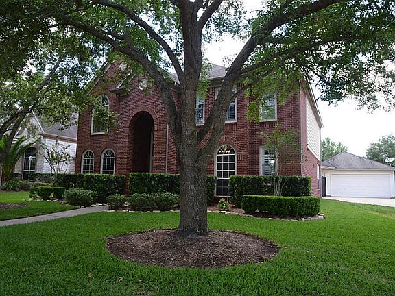 MATURE TREES ADD TO THE MAJESTIC APPEAL OF THIS PERRY HOME!