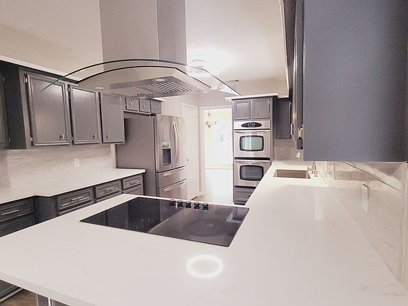 Spacious Kitchen with Cook top, Fridge and Double Oven