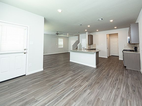 Dining Area to Kitchen and Family Room