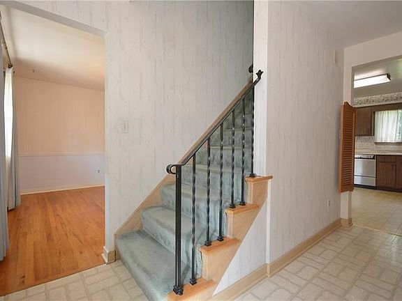 Inviting large entry way welcomes you into this quality built home. Entry way has large closet space for abundant storage.