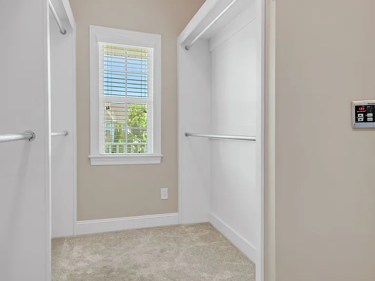 The master bedroom has a walk-in closet with built-ins