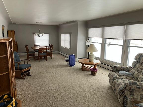 View of living-dining area from the bedroom areas.