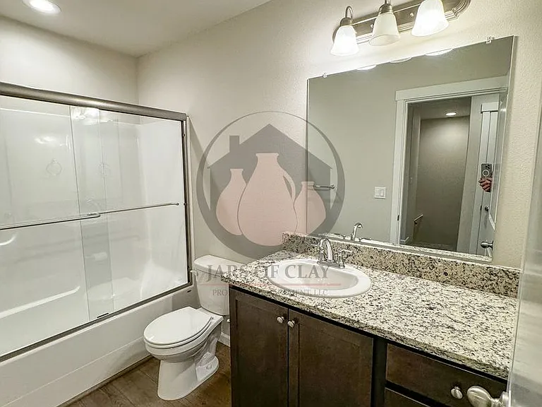 1668 SE Barberry Ave — Photo 13
