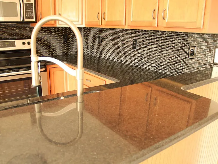 Quartz counter-tops! No sealing needed.