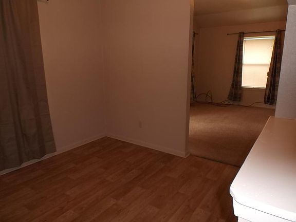 Kitchen to dining to living room view