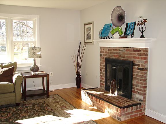 Hardwood floors and wood-burning fireplace
