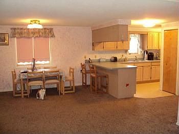 View from the living room to the diningkitchen area.