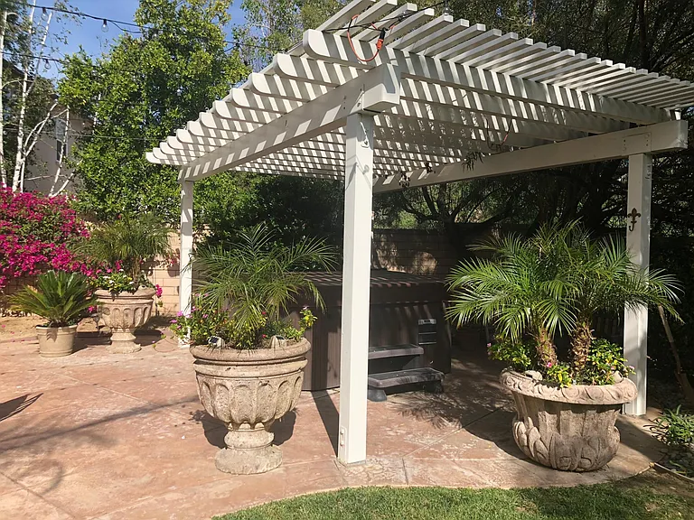 backyard pergola and spa