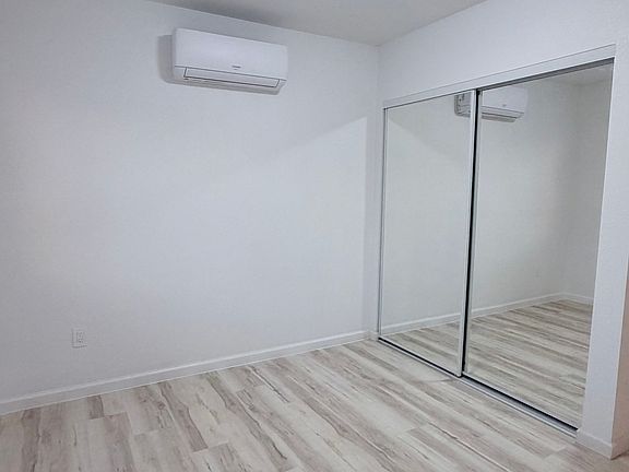 Room 1 with siding door closet and individual bathroom (1 of 2)