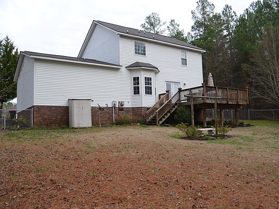 Spacious back yard and deck.