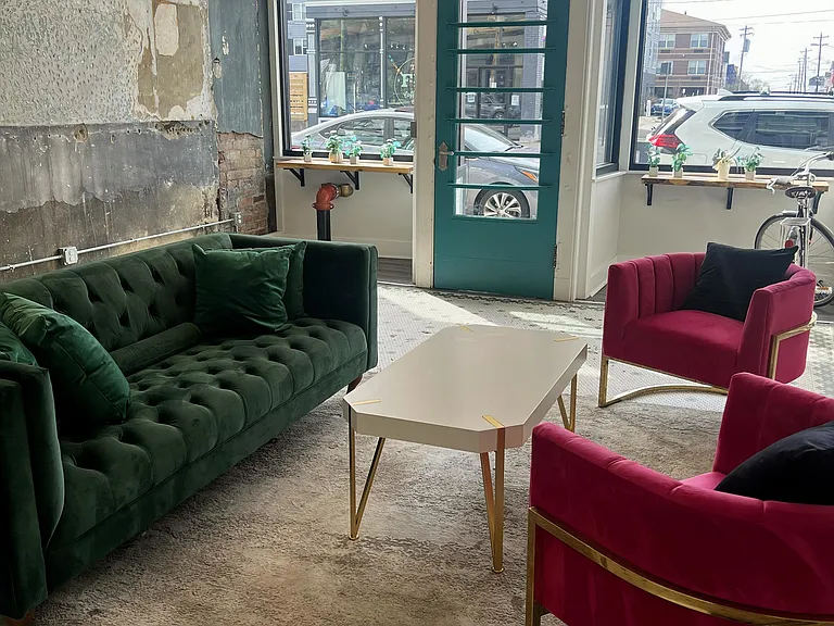 Lobby has secured entry and mail center. The Fix Coffee and cocktails is across the street.