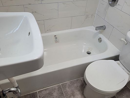 3rd image of 316 E 9th St APT 2F