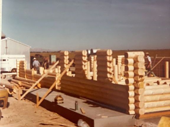 Log home being built in 1978