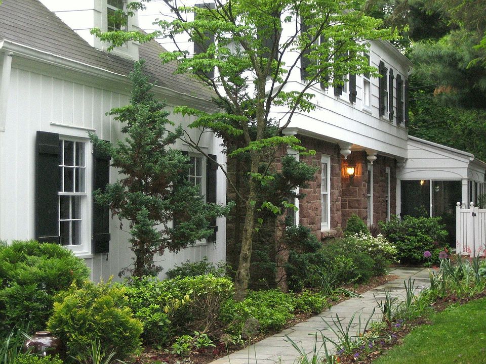 Pristine center hall Colonial on prestigious Upper Montclair street.