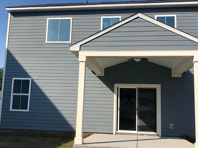 Covered back porch with ceiling fan
