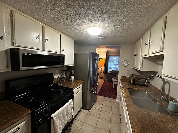 kitchen wider view (you dont see the dishwasher right side of the sink)