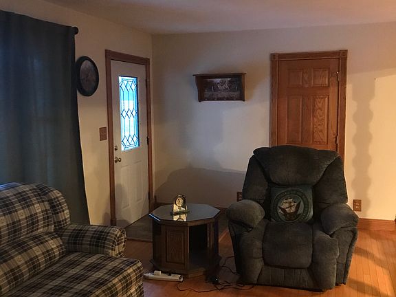 Coat closet, hardwood floors