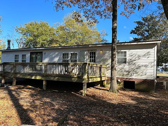 Oversized Deck surrounded with beautiful trees