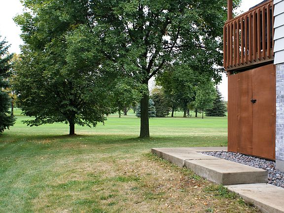 To back yard and golf course