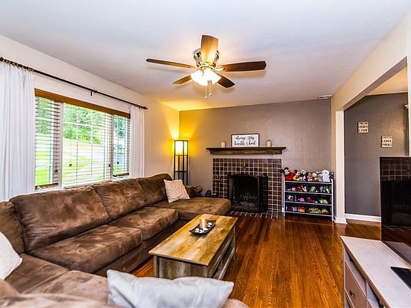 Living room with cozy fireplace.