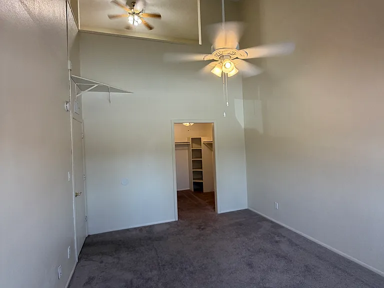 Master Bedroom View of Master Closet & Loft above