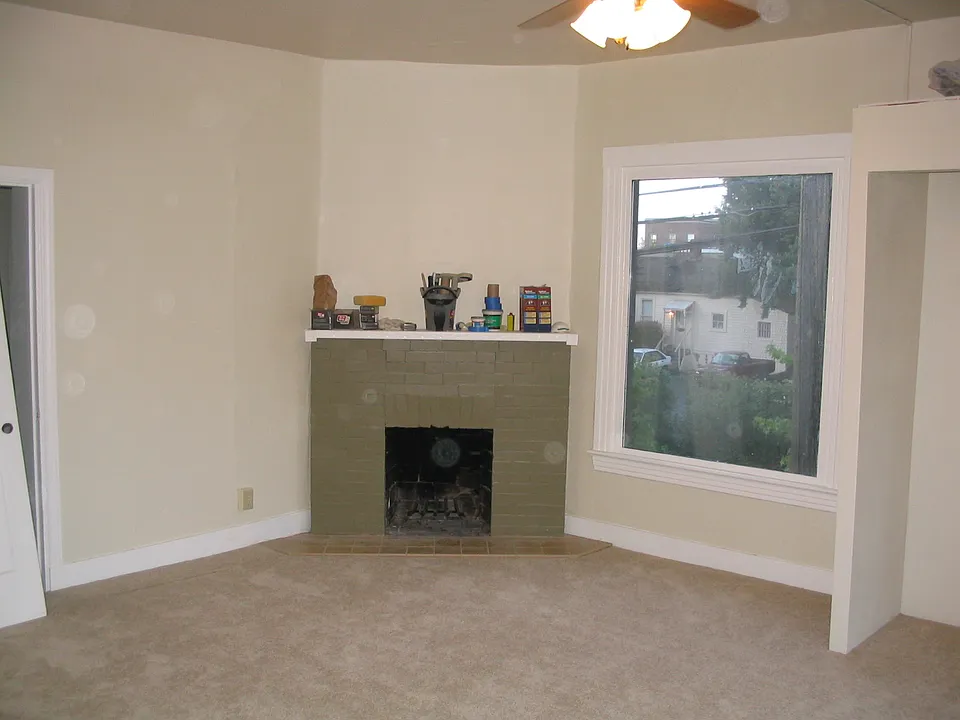 Now has original hardwood floors -Older photo