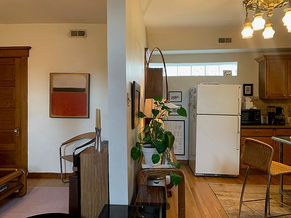 Living room partially separated from kitchen