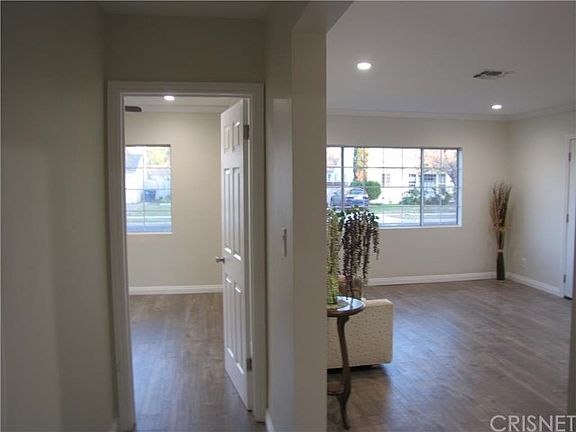 This is one of the 2 bedrooms located off the living room in this 4 bedroom home.