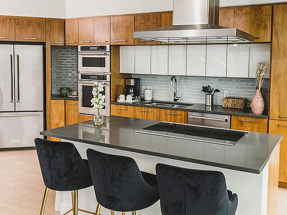 Condo-quality finishes with granite counters, two-tone counters, and more