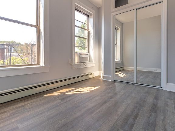 Second bedroom fits a queen bed and has amazing southern light.