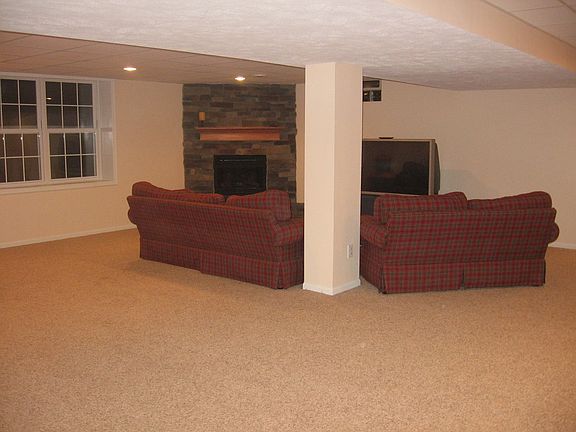 Basement Fireplace and Garden Window