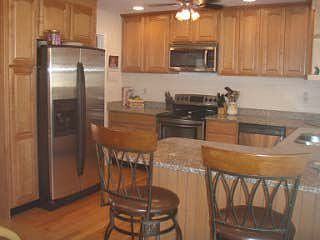 new kitchen with granite counters